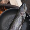 fish on black frying pan